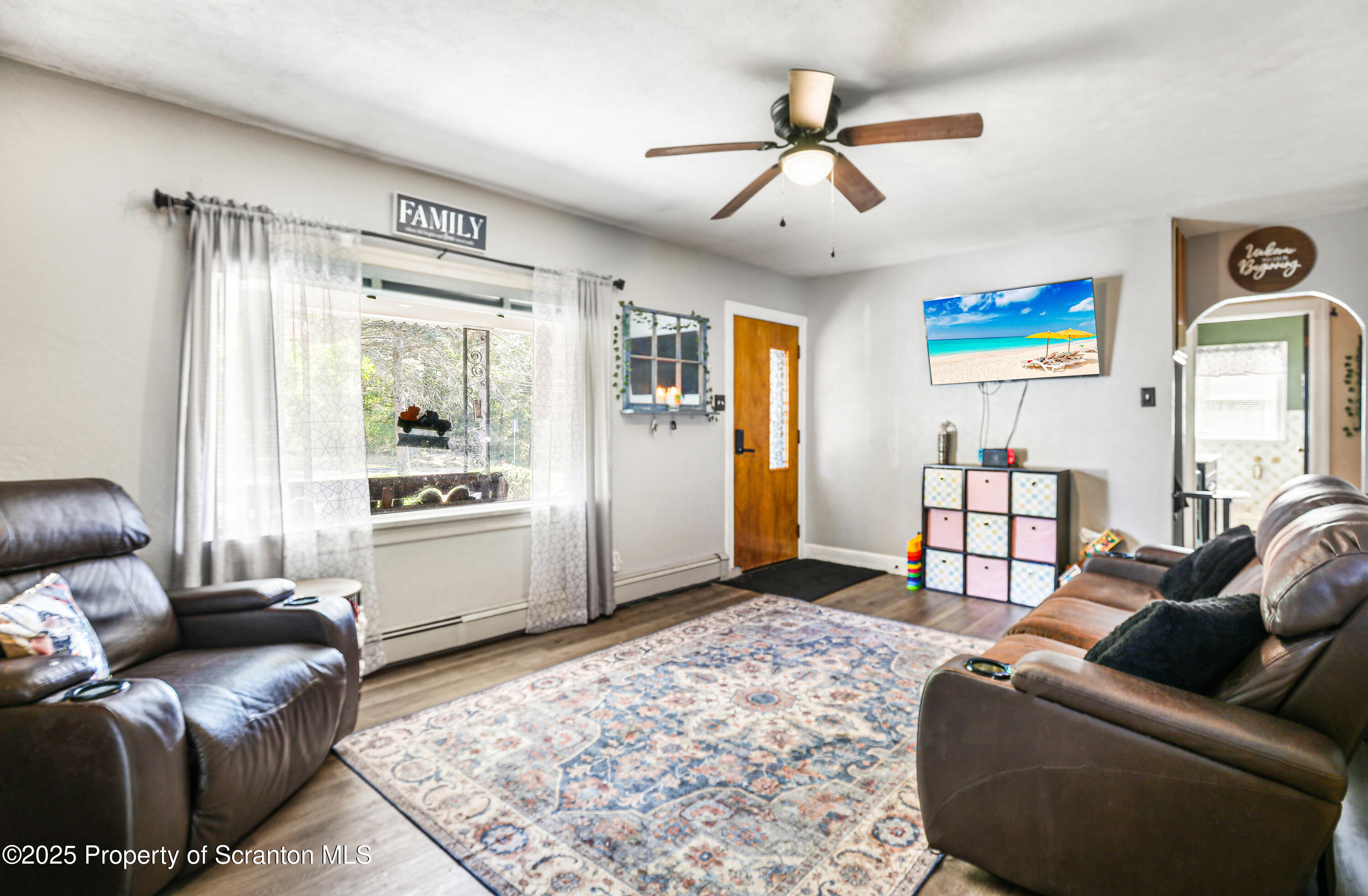 7840 Blue Ridge Trail Mountain Top, PA 18707 - Photo 17 of 20 a living room with furniture and a rug