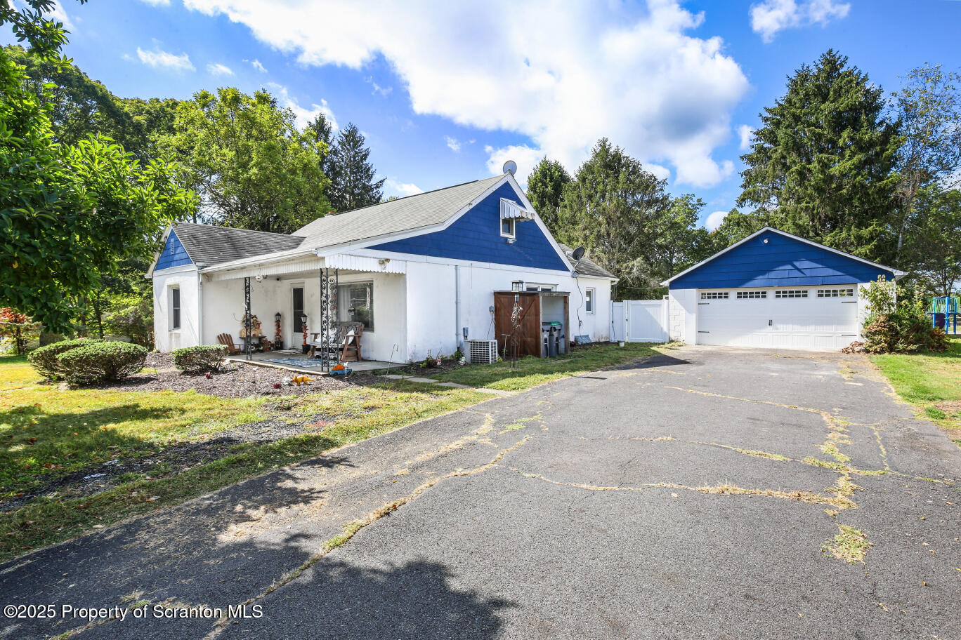 7840 Blue Ridge Trail Mountain Top, PA 18707 - Photo 2 of 20 a house with swimming pool in front of it