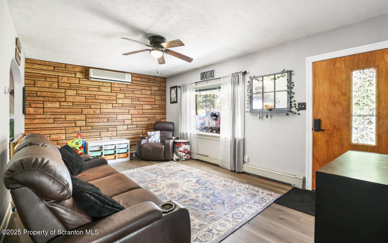 7840 Blue Ridge Trail Mountain Top, PA 18707 - Photo 9 of 20 a living room with furniture and a window
