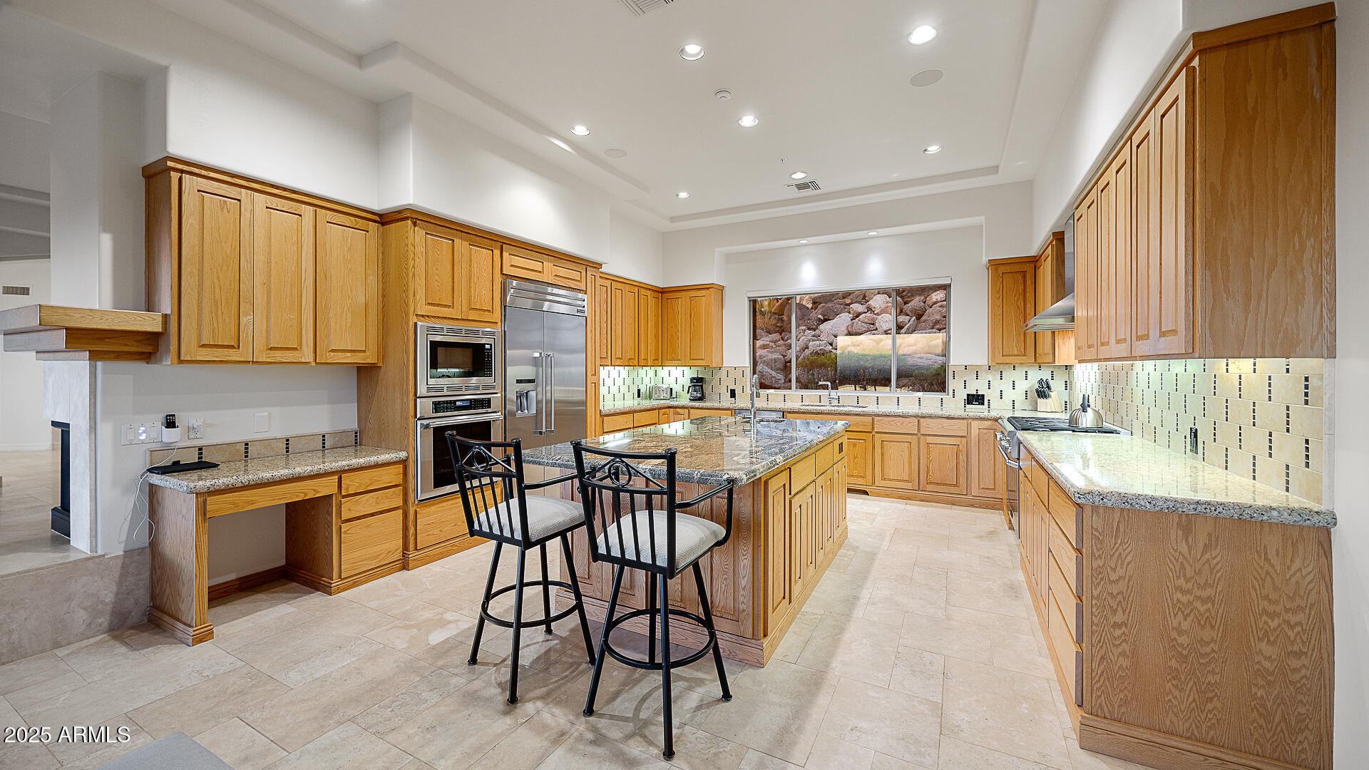 5316 East Valle Vista Road Phoenix, AZ 85018 - Photo 7 of 21 a large kitchen with cabinets table and chairs