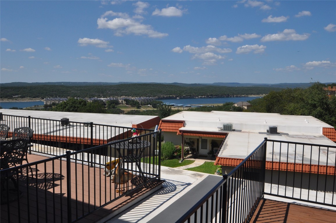 a view of a roof deck with couches