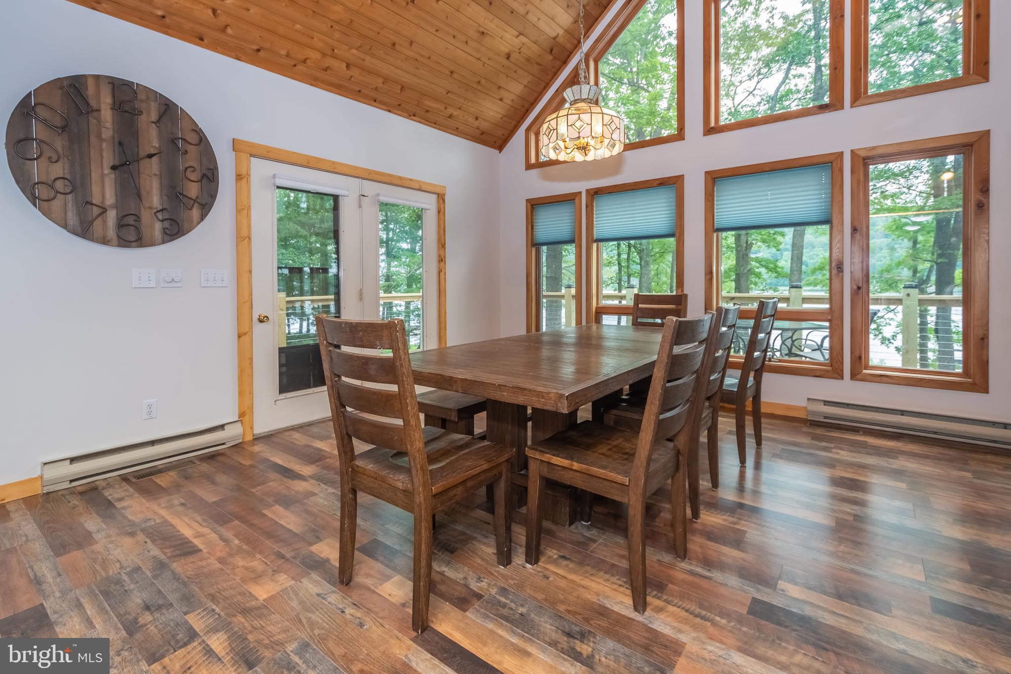 1140 Rock Lodge Road McHenry, MD 21541 - Photo 44 of 60 a view of a dining room with furniture window and outside view