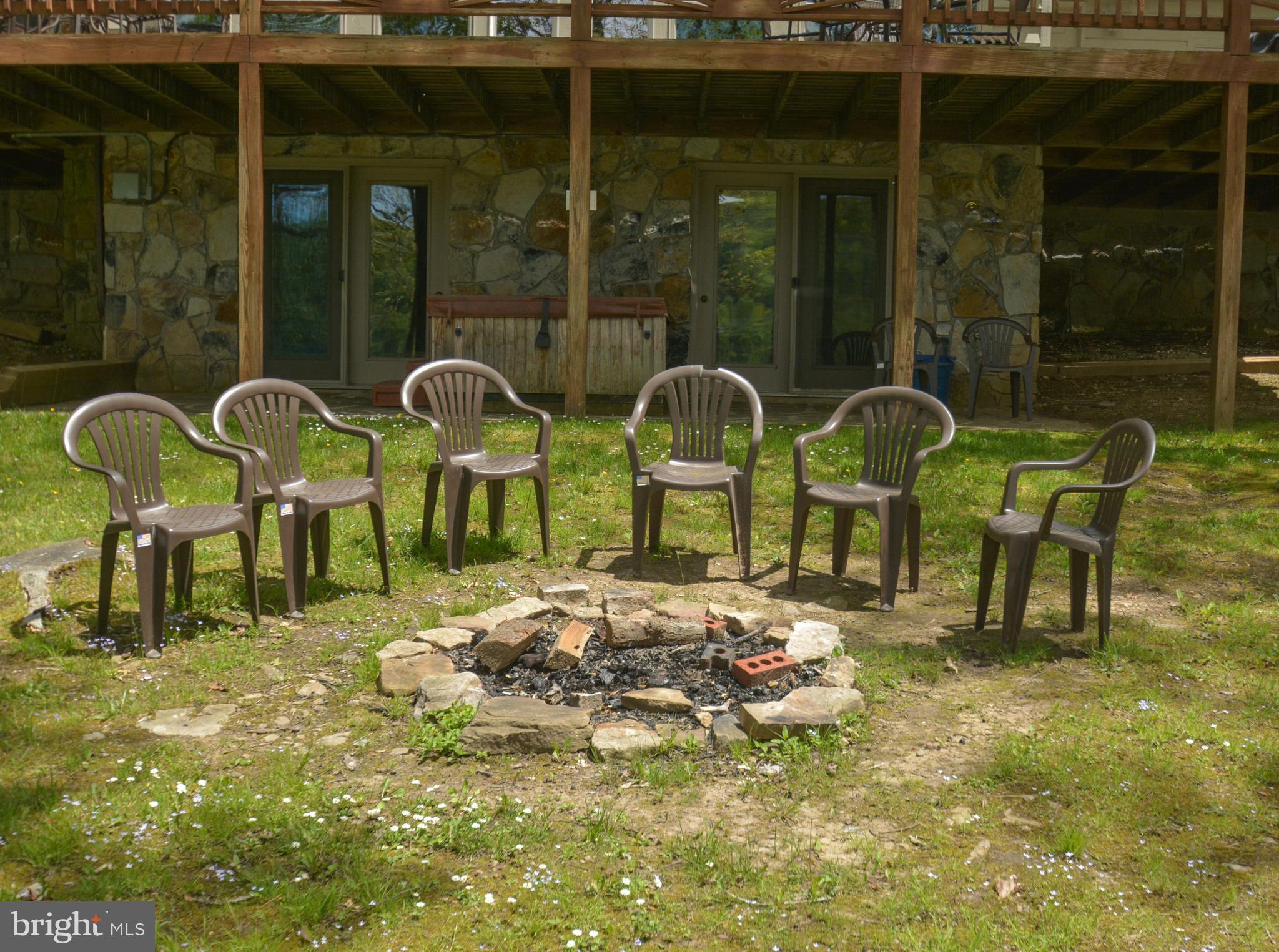 1140 Rock Lodge Road McHenry, MD 21541 - Photo 10 of 60 a group of chairs sitting in front of building