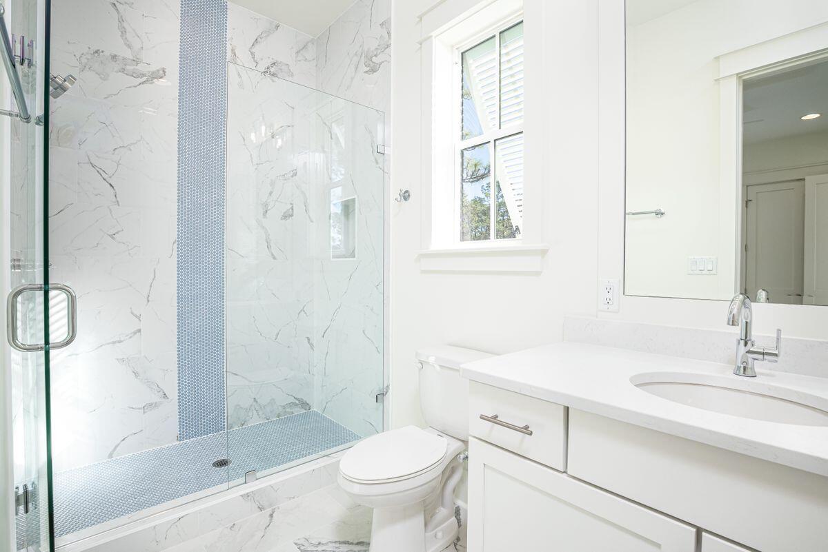 274 Redbud Ln Inlet Beach Inlet Beach, FL 32461 - Photo 11 of 25 a bathroom with a sink toilet and shower