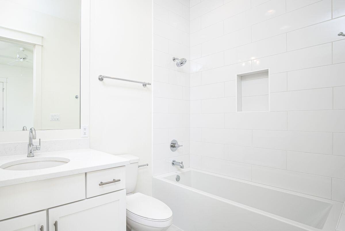 274 Redbud Ln Inlet Beach Inlet Beach, FL 32461 - Photo 13 of 25 a bathroom with a bathtub shower sink vanity and toilet