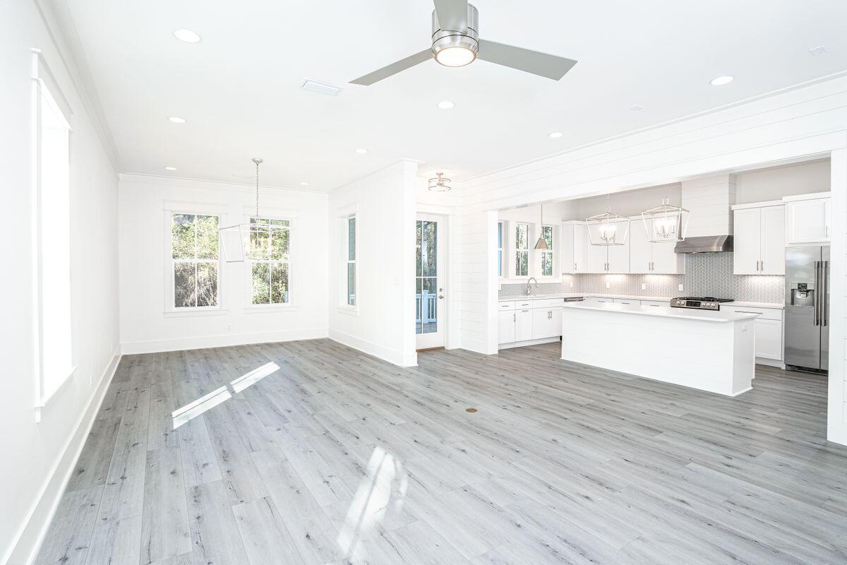 274 Redbud Ln Inlet Beach Inlet Beach, FL 32461 - Photo 3 of 25 a view of kitchen with wooden floor and window