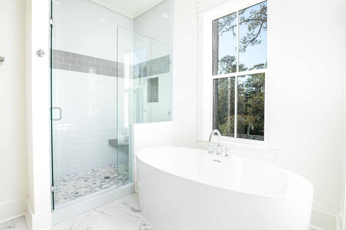 274 Redbud Ln Inlet Beach Inlet Beach, FL 32461 - Photo 9 of 25 a bathroom with a bathtub and a shower