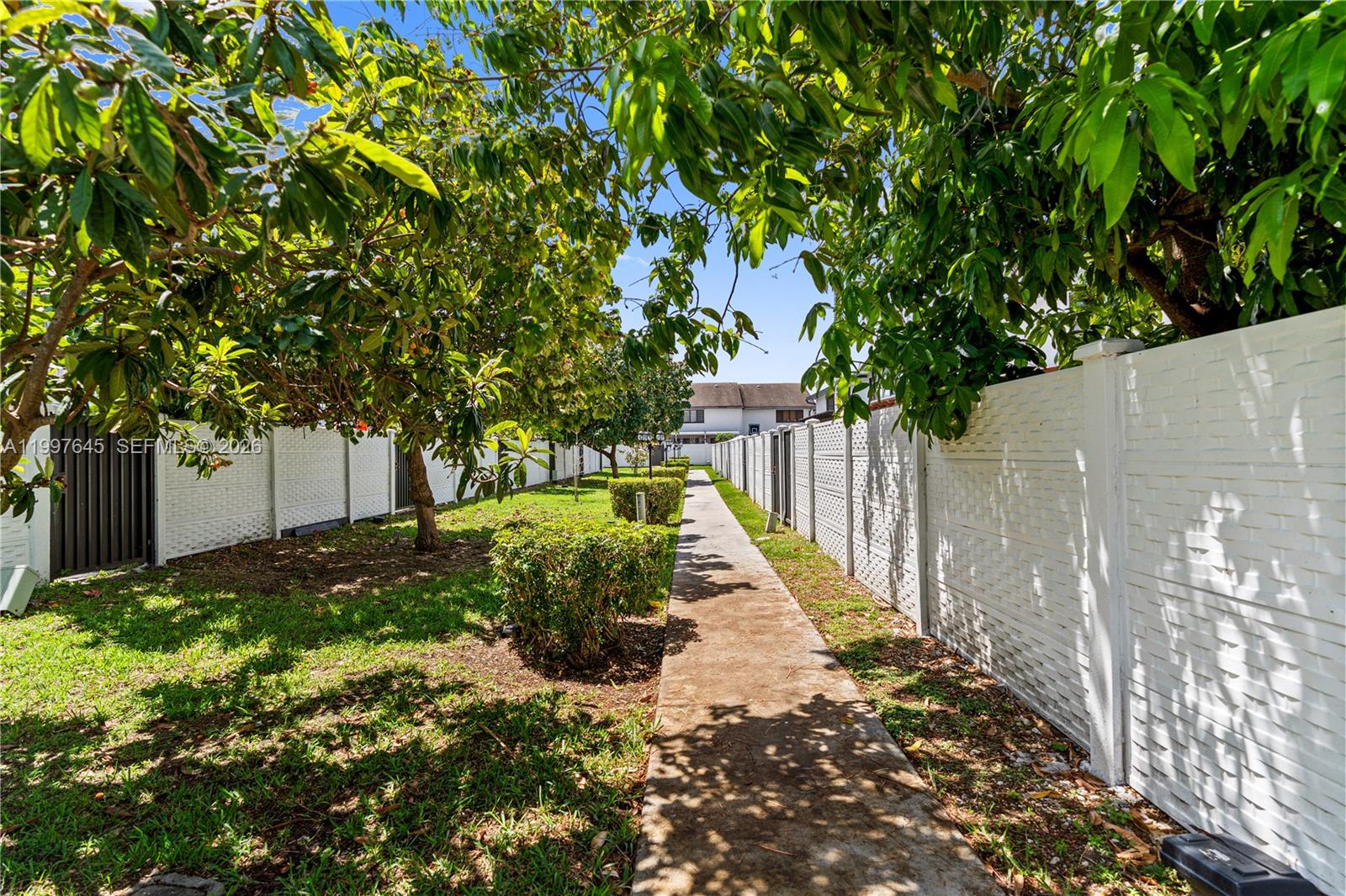 8748 Southwest 154th Cir Place, Unit 6N Miami, FL 33193 - Photo 28 of 34 a view of yard with green space