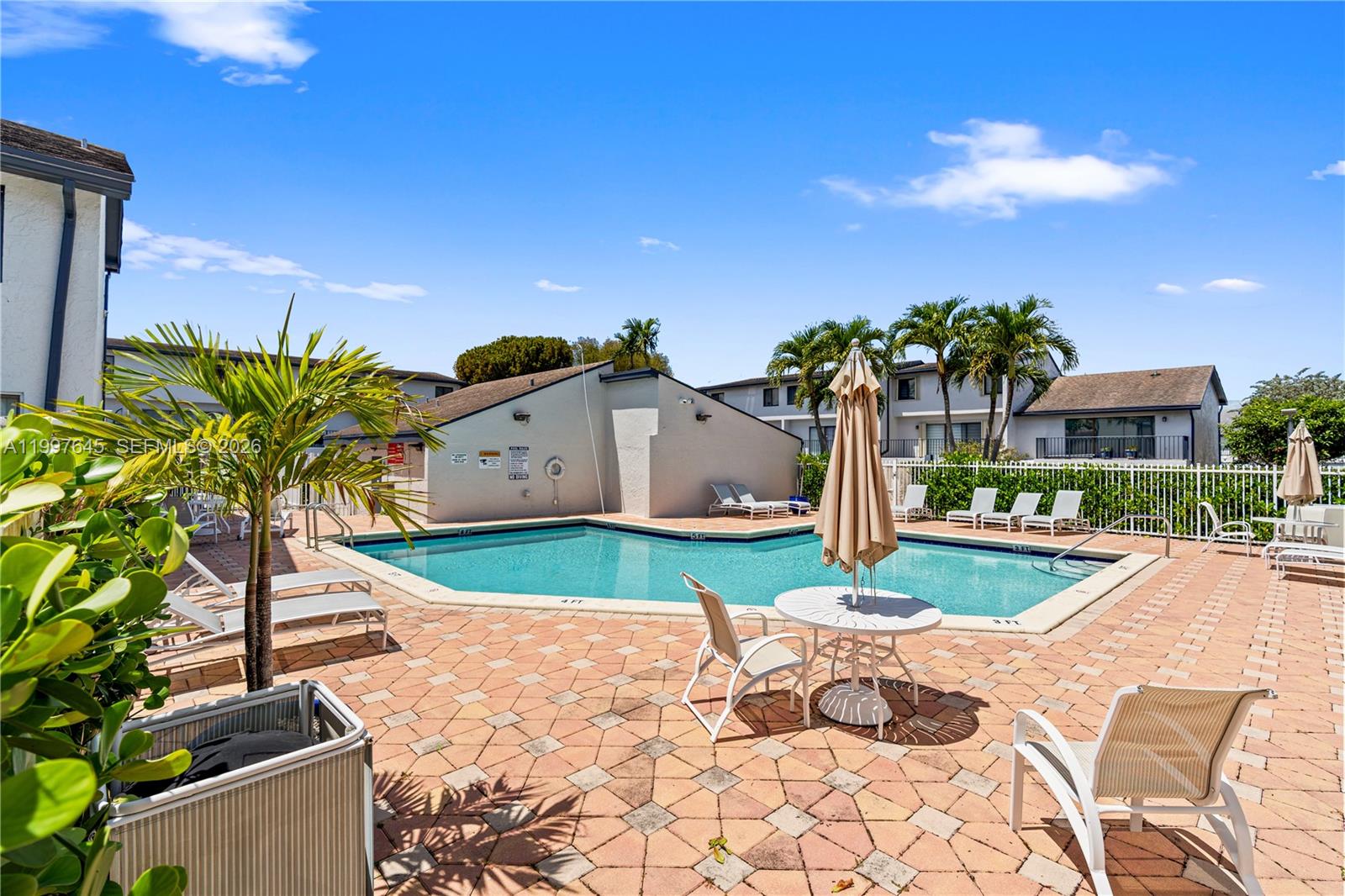 8748 Southwest 154th Cir Place, Unit 6N Miami, FL 33193 - Photo 29 of 34 a view of a backyard