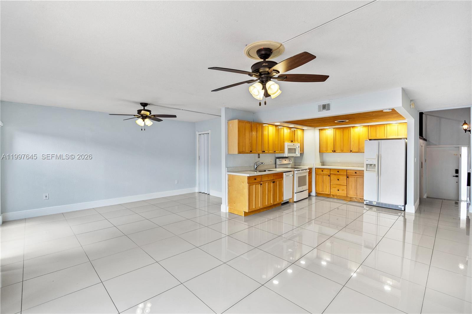 8748 Southwest 154th Cir Place, Unit 6N Miami, FL 33193 - Photo 8 of 34 a view of an empty room with a window