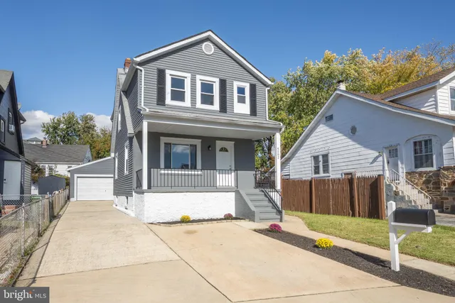 a front view of a house with a porch