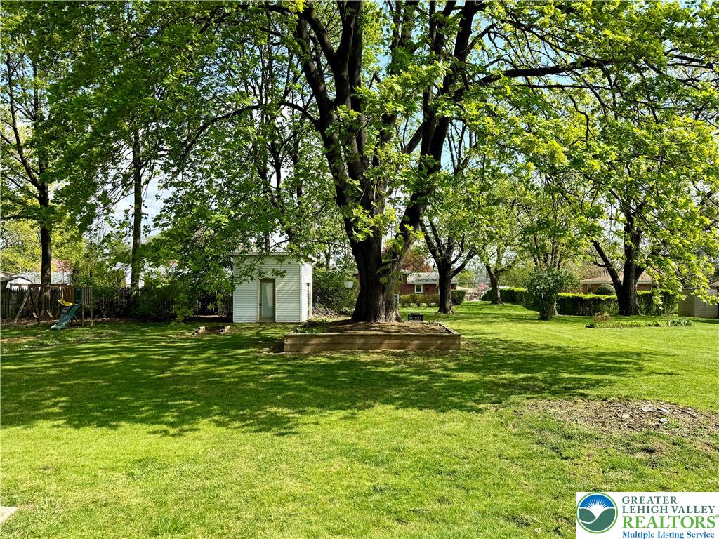 4019 Gettysburg Road Camp Hill, PA 17011 - Photo 5 of 25 backyard with shed