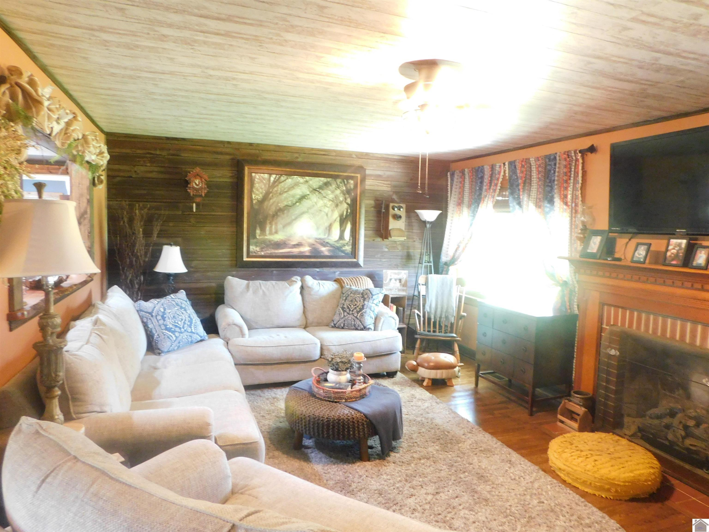 4075 Radio Road Almo, KY 42020 - Photo 7 of 29 LIVING ROOM WITH GAS LOG FIREPLACE