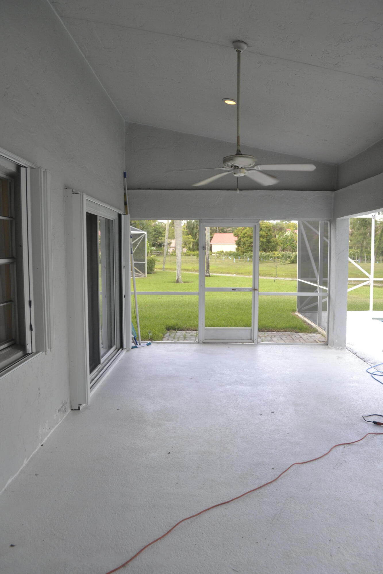 1104 Raintree Lane Wellington, FL 33414 - Photo 16 of 30 Covered Patio Vault ceiling to pool