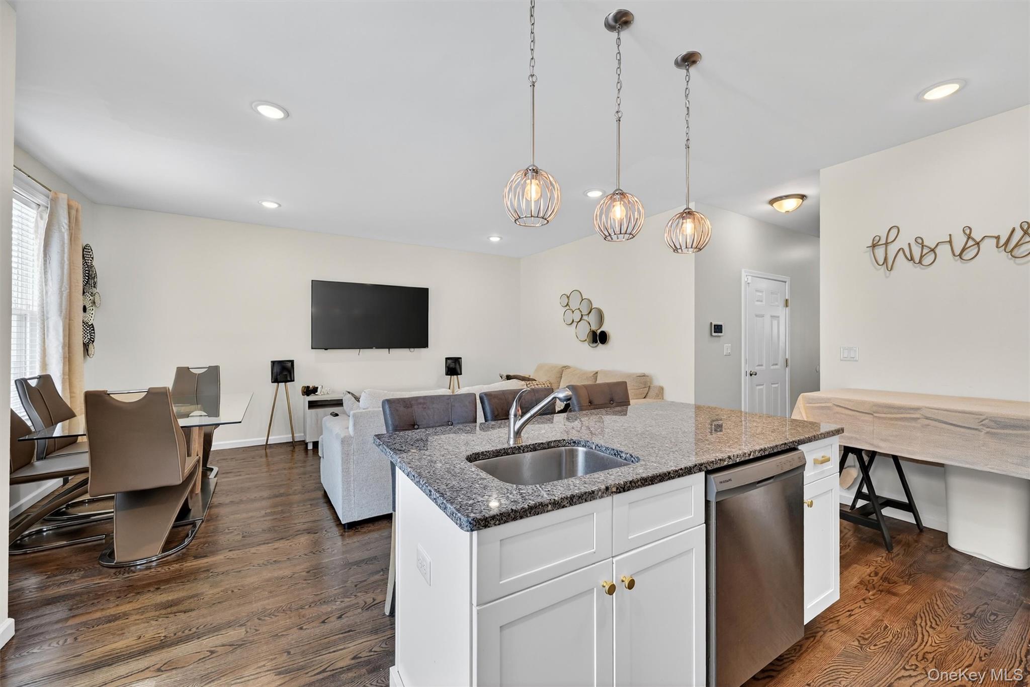 76 Magnolia Park Road Middletown, NY 10940 - Photo 38 of 39 a kitchen with a counter space a sink appliances and a wooden floor