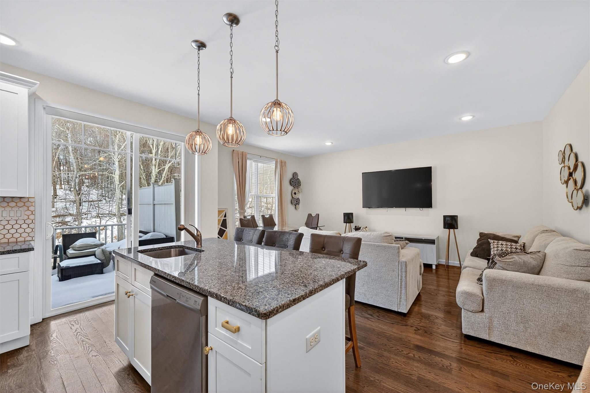 76 Magnolia Park Road Middletown, NY 10940 - Photo 39 of 39 a living room with furniture a flat screen tv and a large window