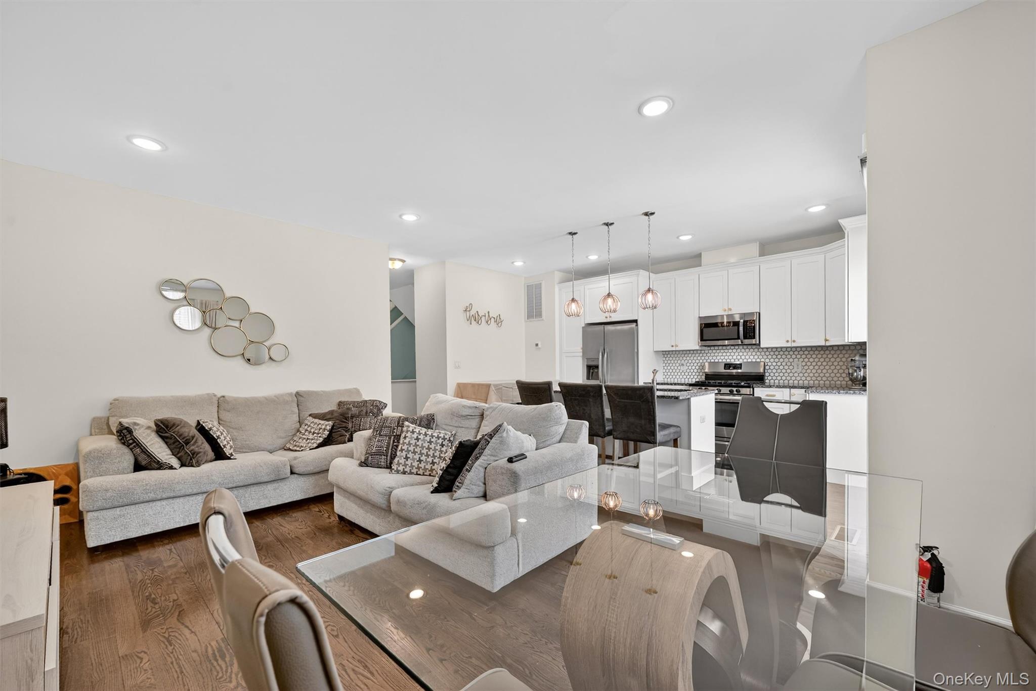 76 Magnolia Park Road Middletown, NY 10940 - Photo 16 of 39 a living room with furniture and a view of kitchen