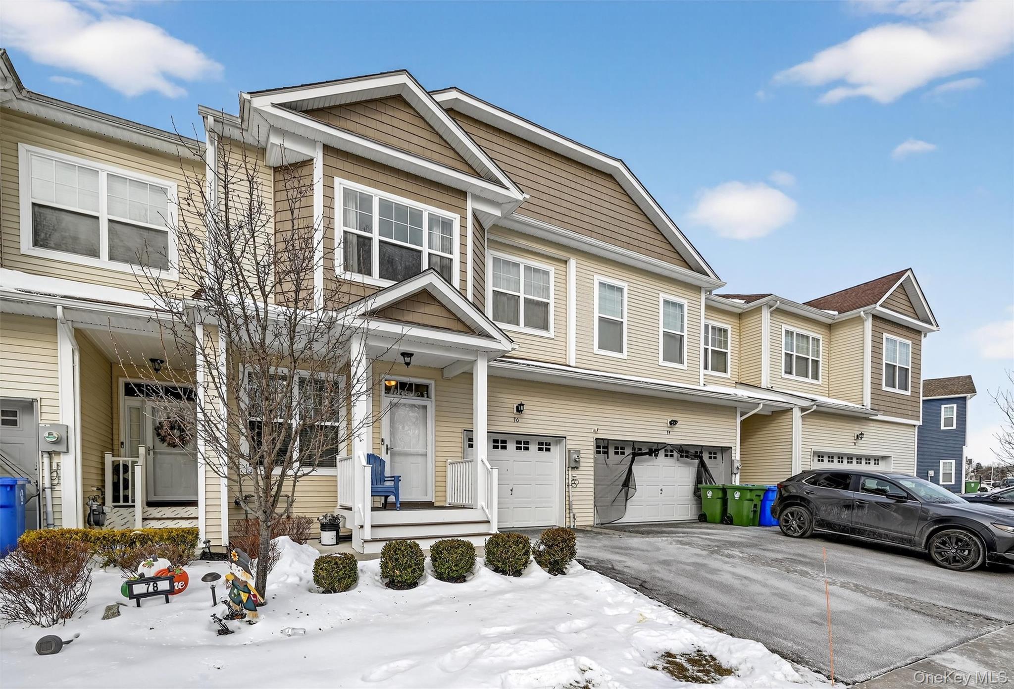 76 Magnolia Park Road Middletown, NY 10940 - Photo 2 of 39 a front view of a house with a yard