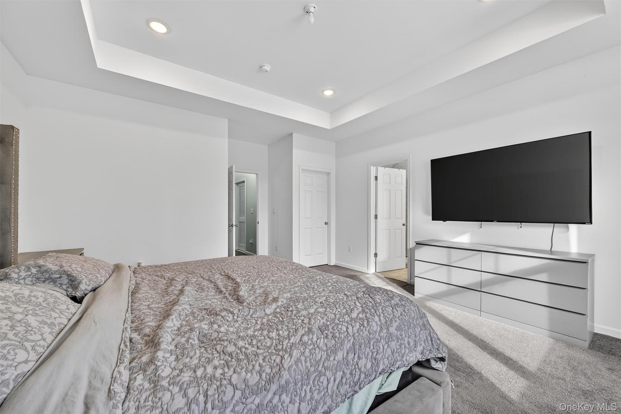 76 Magnolia Park Road Middletown, NY 10940 - Photo 20 of 39 a bedroom with a bed and a flat screen tv