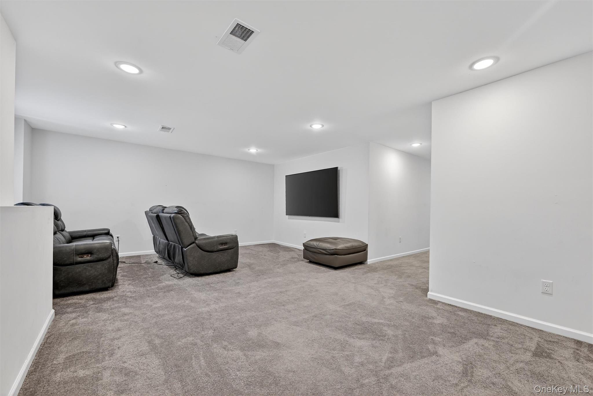 76 Magnolia Park Road Middletown, NY 10940 - Photo 35 of 39 a room with furniture and a air conditioner vent