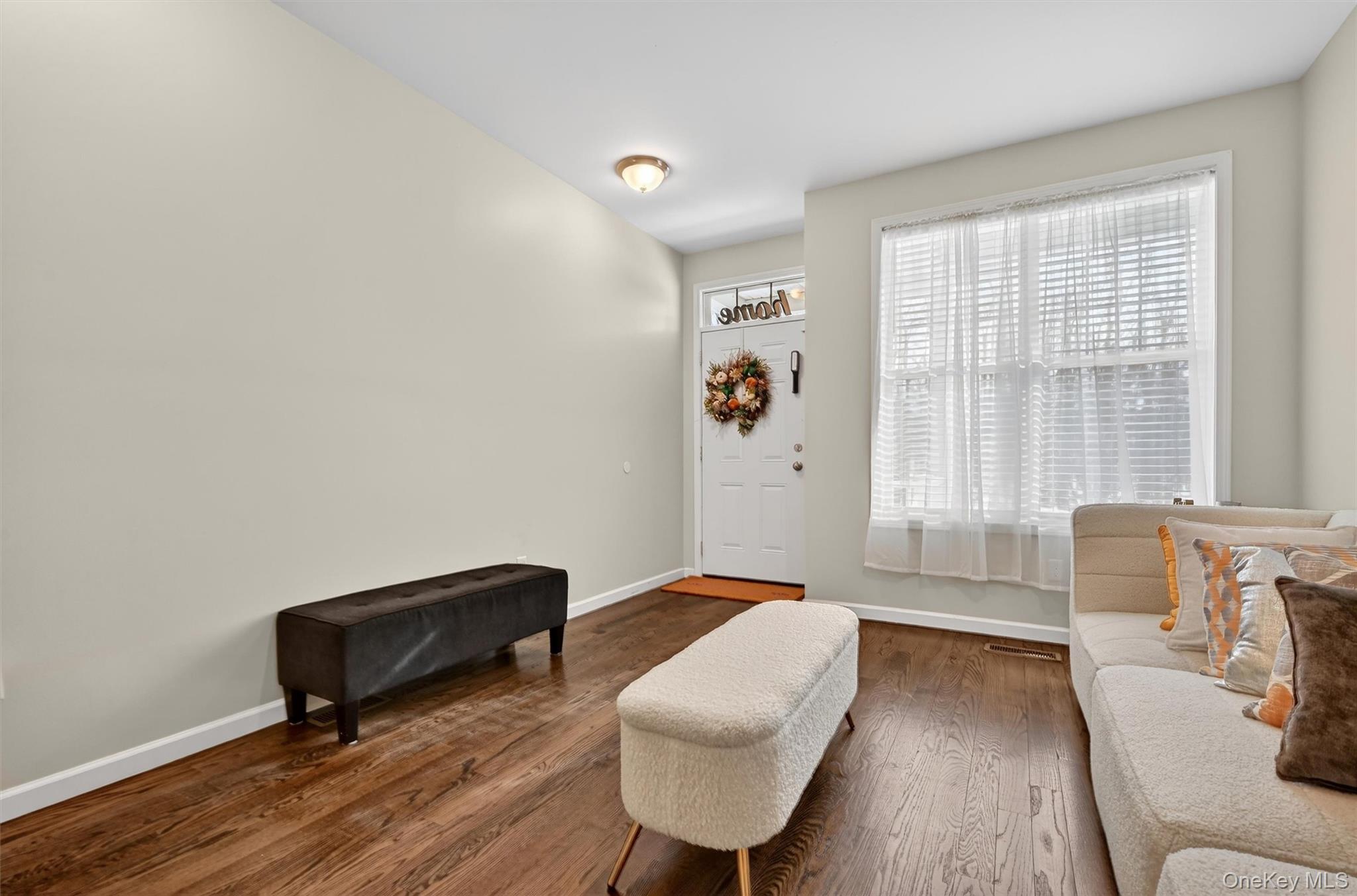 76 Magnolia Park Road Middletown, NY 10940 - Photo 8 of 39 a living room with furniture and a window