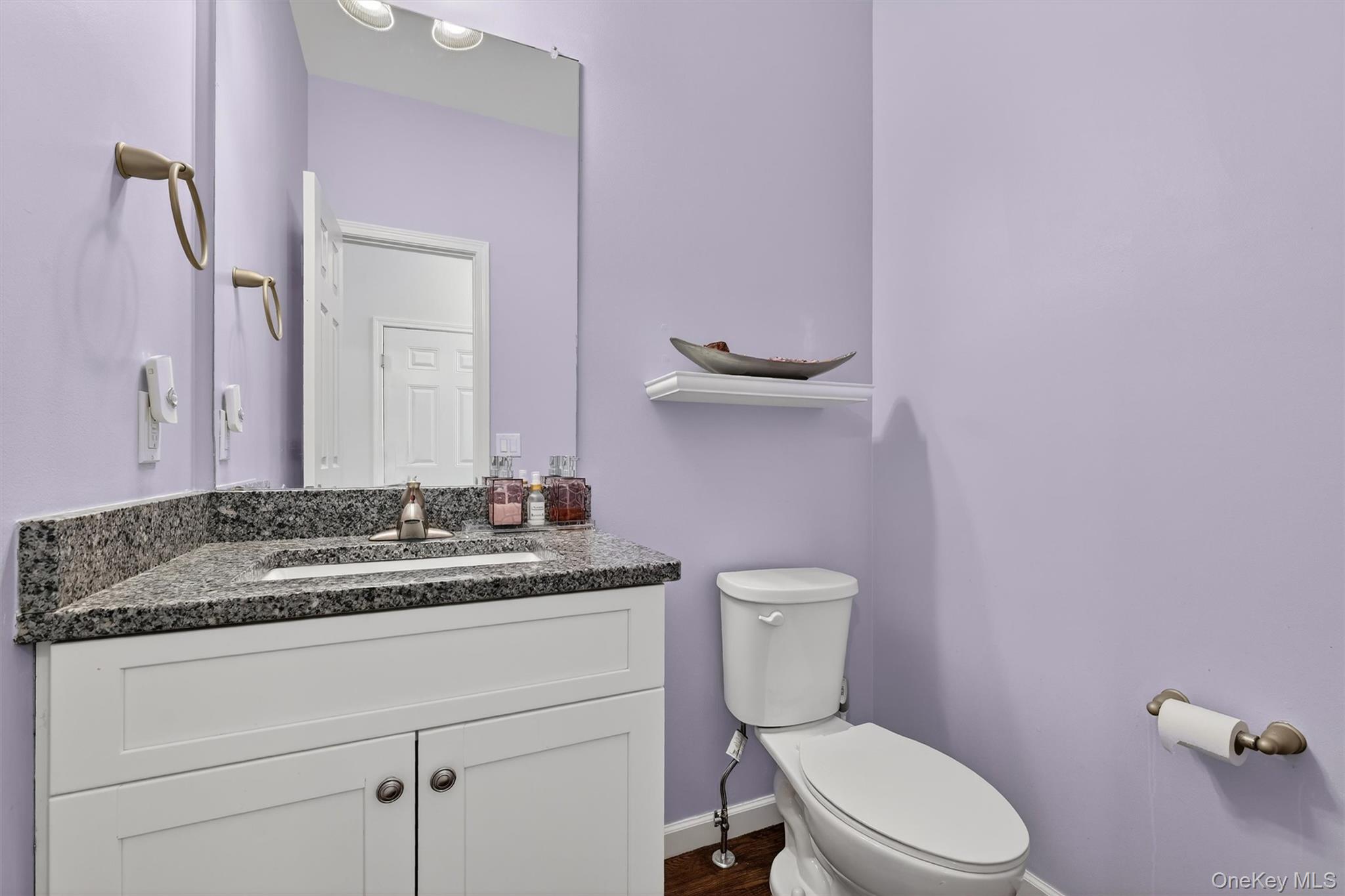 76 Magnolia Park Road Middletown, NY 10940 - Photo 10 of 39 a bathroom with a granite countertop toilet sink and mirror