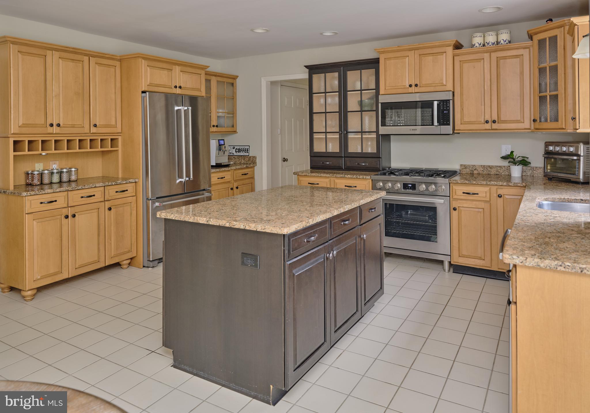 71 Big Spring Road Califon, NJ 07830 - Photo 13 of 41 a kitchen with stainless steel appliances granite countertop a sink stove and refrigerator