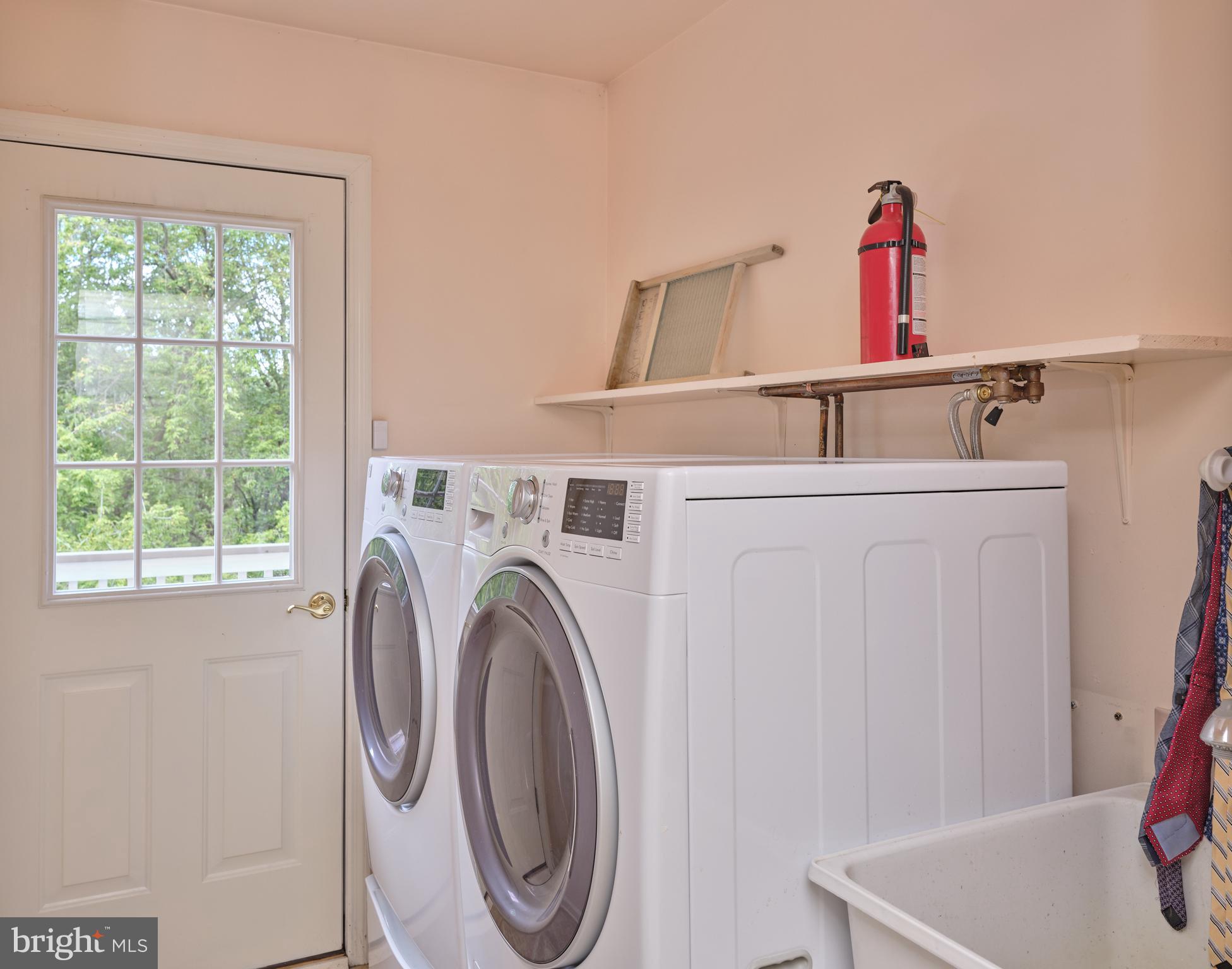 71 Big Spring Road Califon, NJ 07830 - Photo 16 of 41 a utility room with dryer and washer