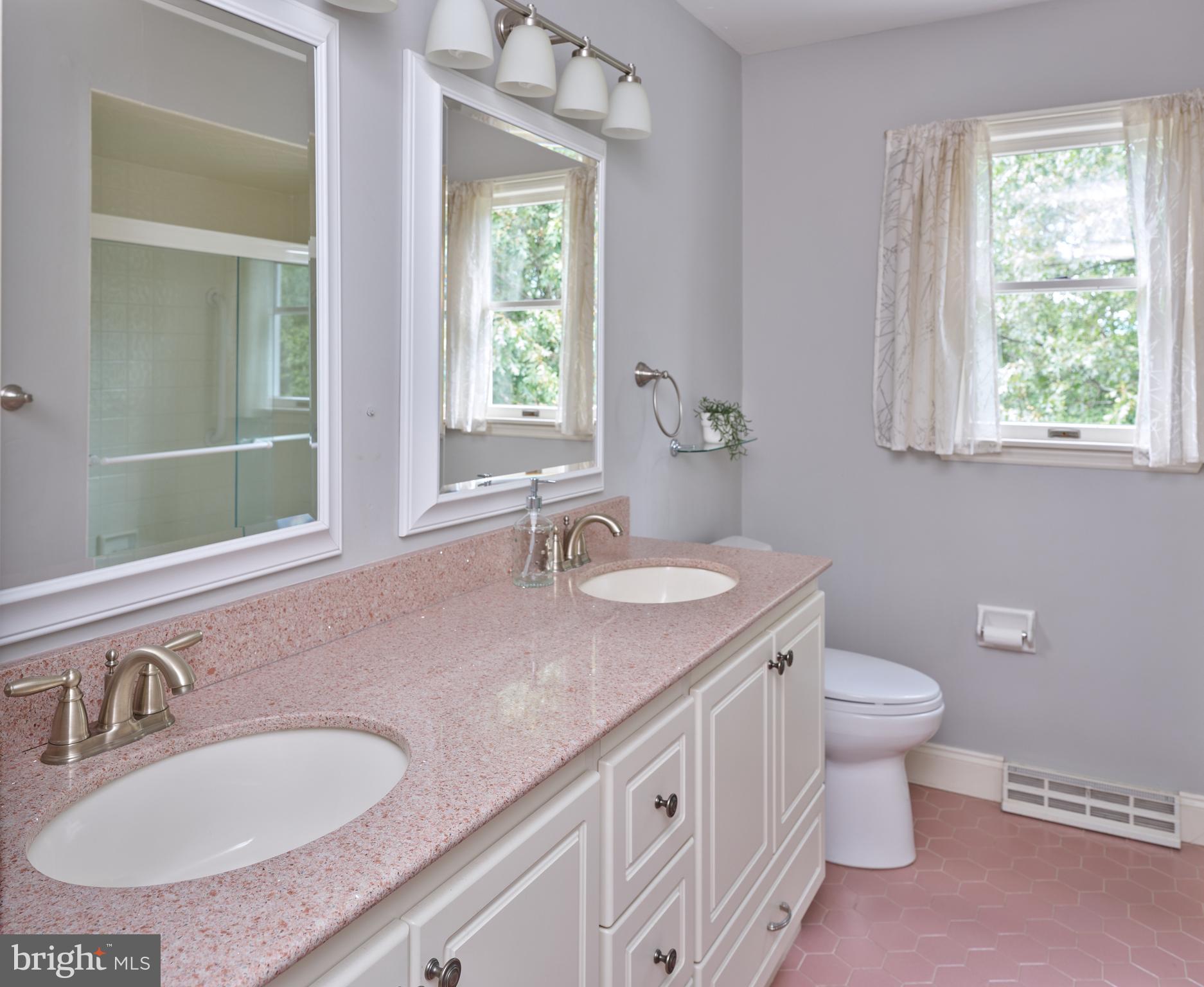 71 Big Spring Road Califon, NJ 07830 - Photo 26 of 41 a bathroom with a granite countertop sink and a mirror