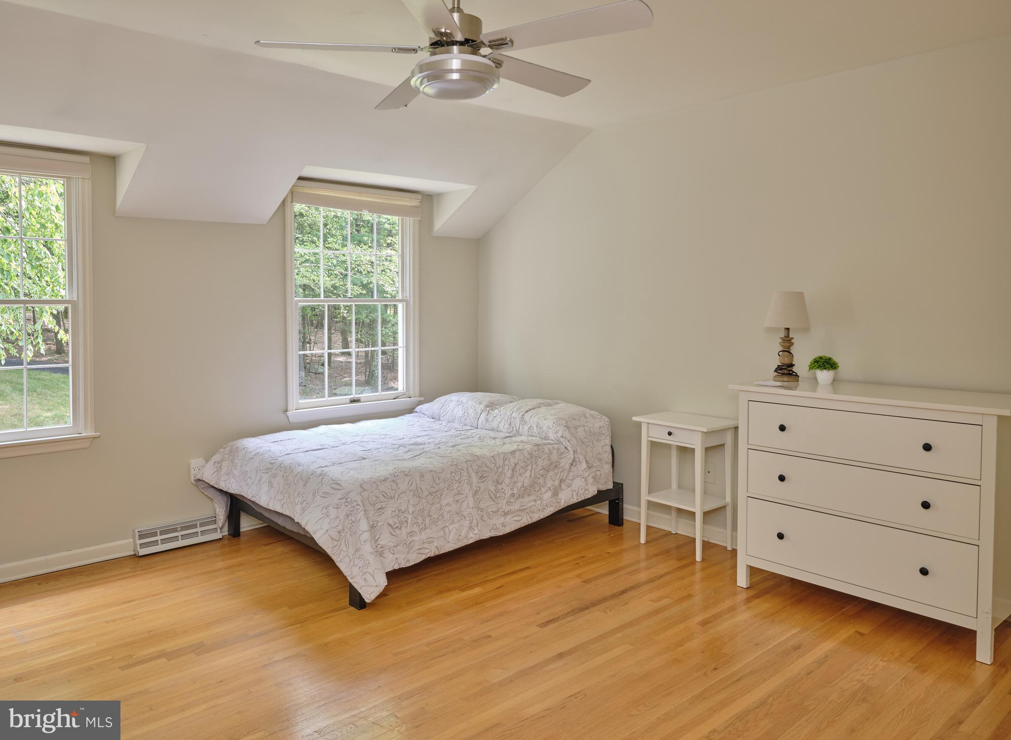 71 Big Spring Road Califon, NJ 07830 - Photo 27 of 41 a bedroom with a bed and a window
