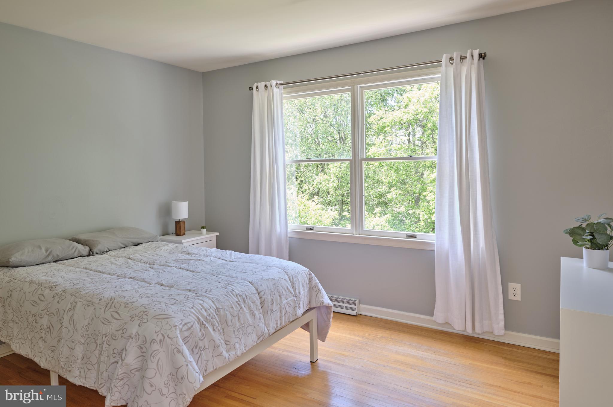 71 Big Spring Road Califon, NJ 07830 - Photo 28 of 41 a bedroom with a bed and a window