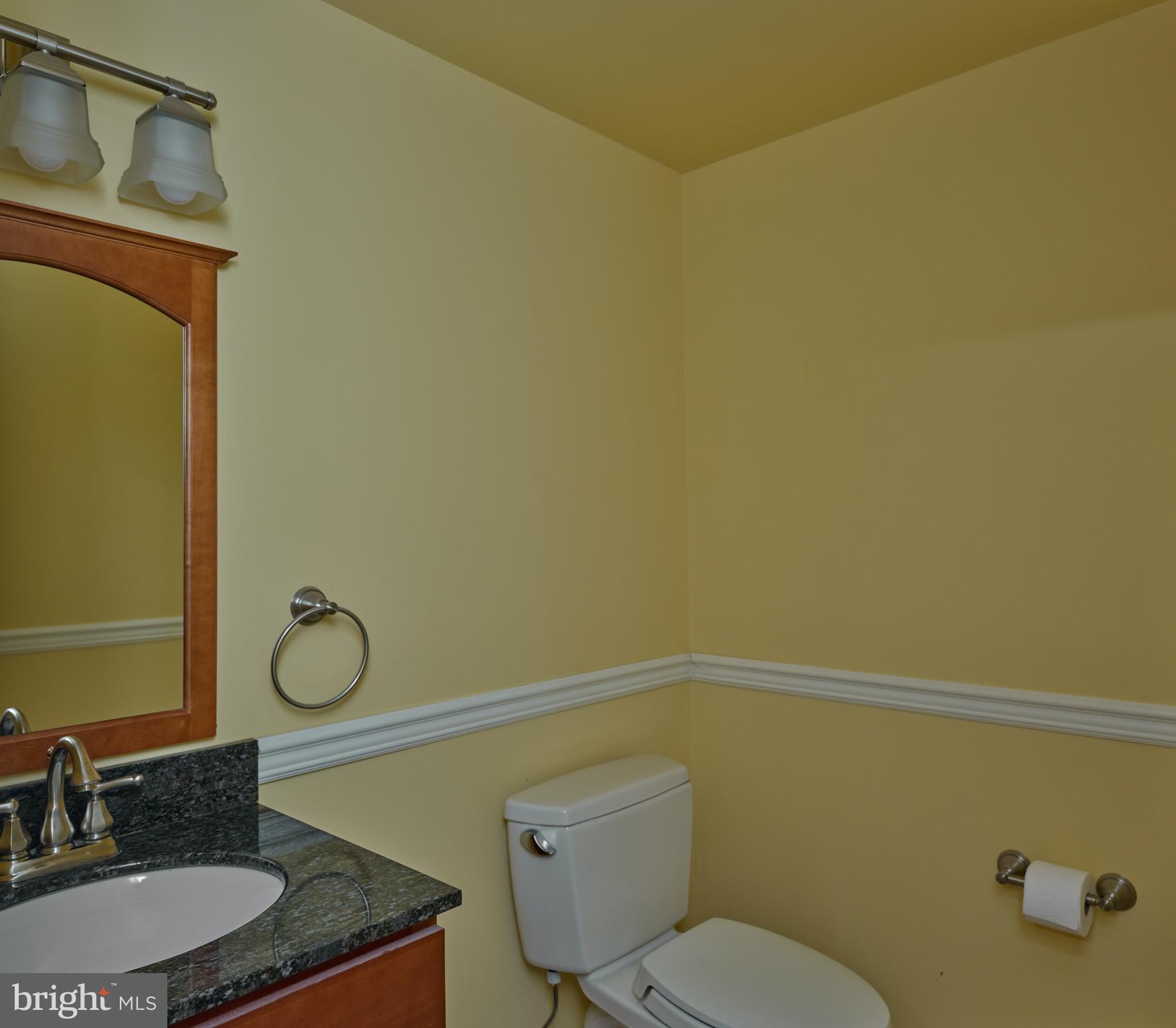 71 Big Spring Road Califon, NJ 07830 - Photo 31 of 41 a bathroom with a granite countertop toilet sink and mirror