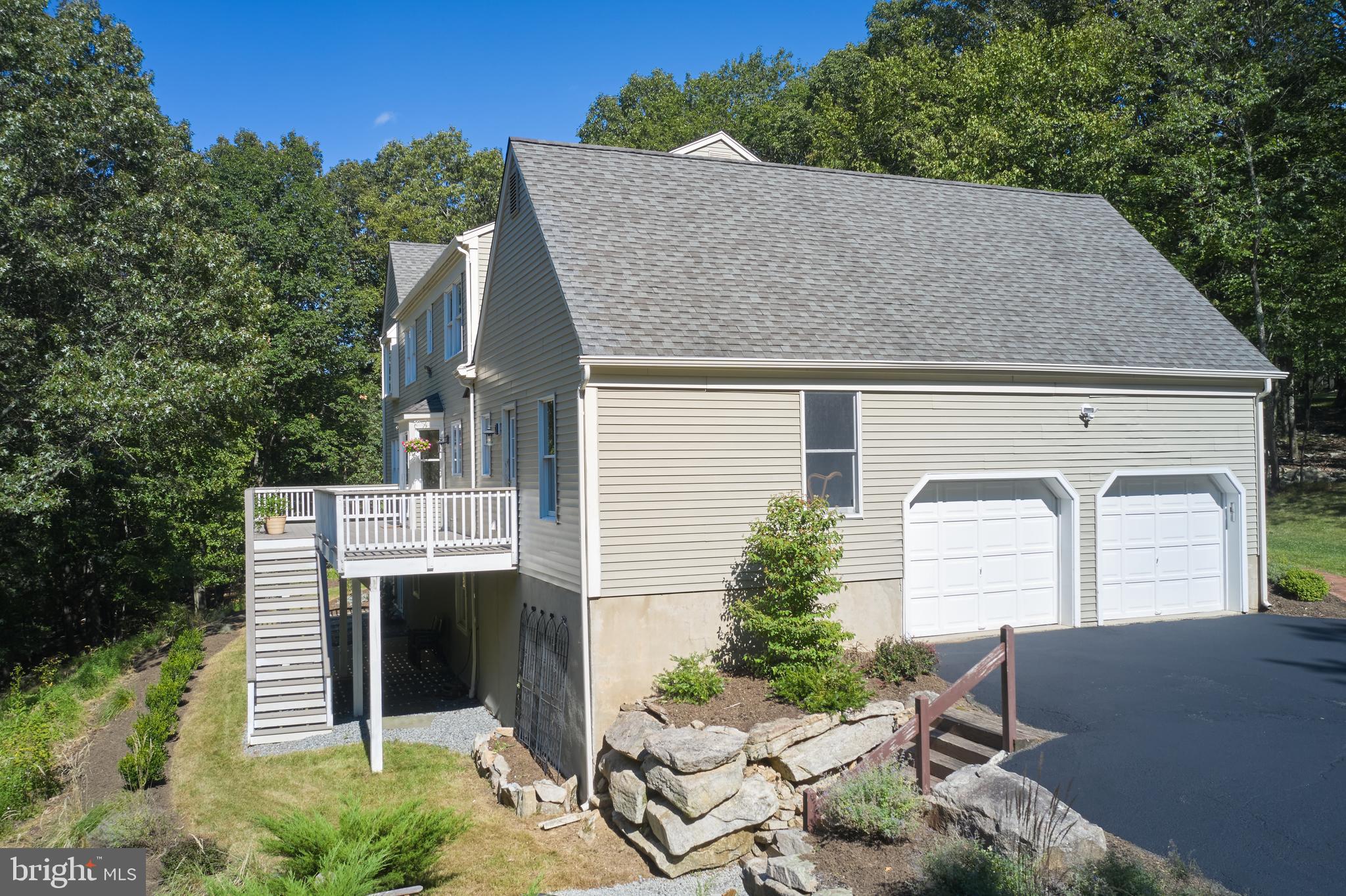 71 Big Spring Road Califon, NJ 07830 - Photo 38 of 41 a house view with a garden space