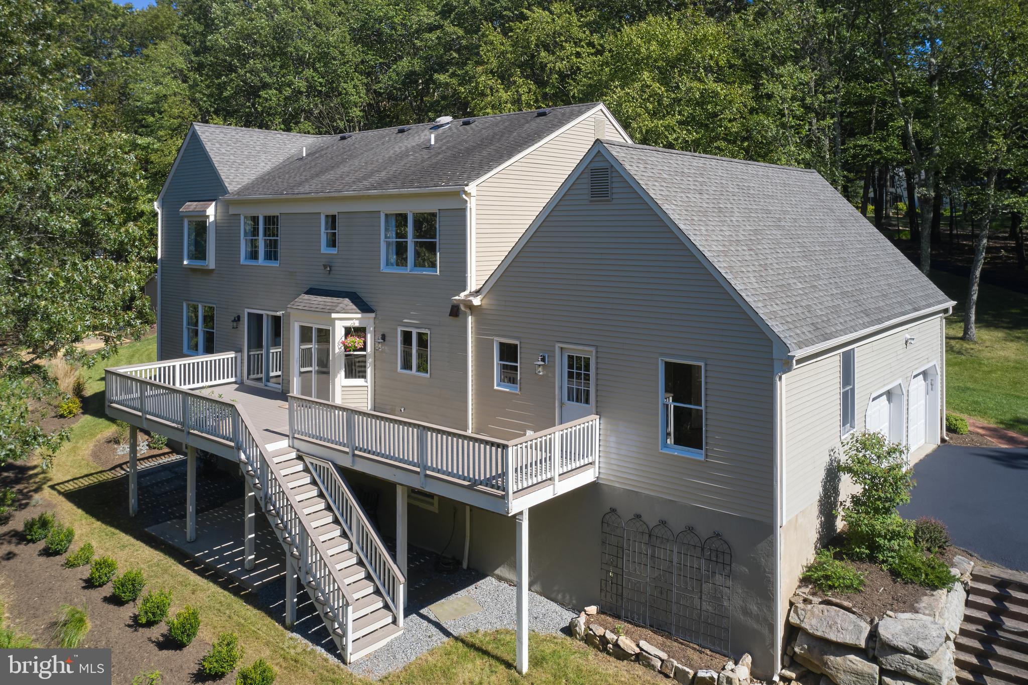 71 Big Spring Road Califon, NJ 07830 - Photo 39 of 41 a aerial view of a house next to a yard