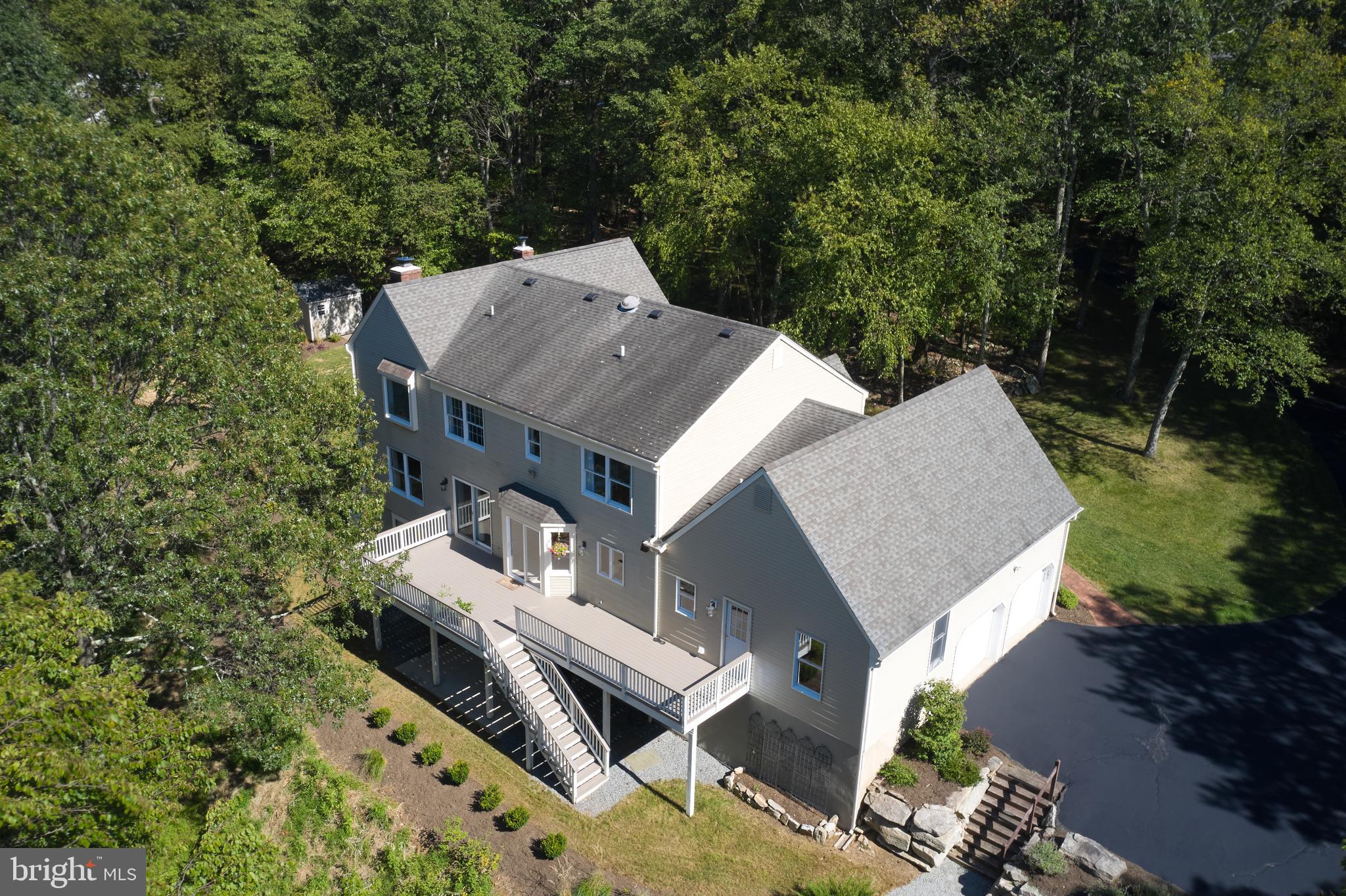 71 Big Spring Road Califon, NJ 07830 - Photo 40 of 41 an aerial view of a house with a yard and balcony