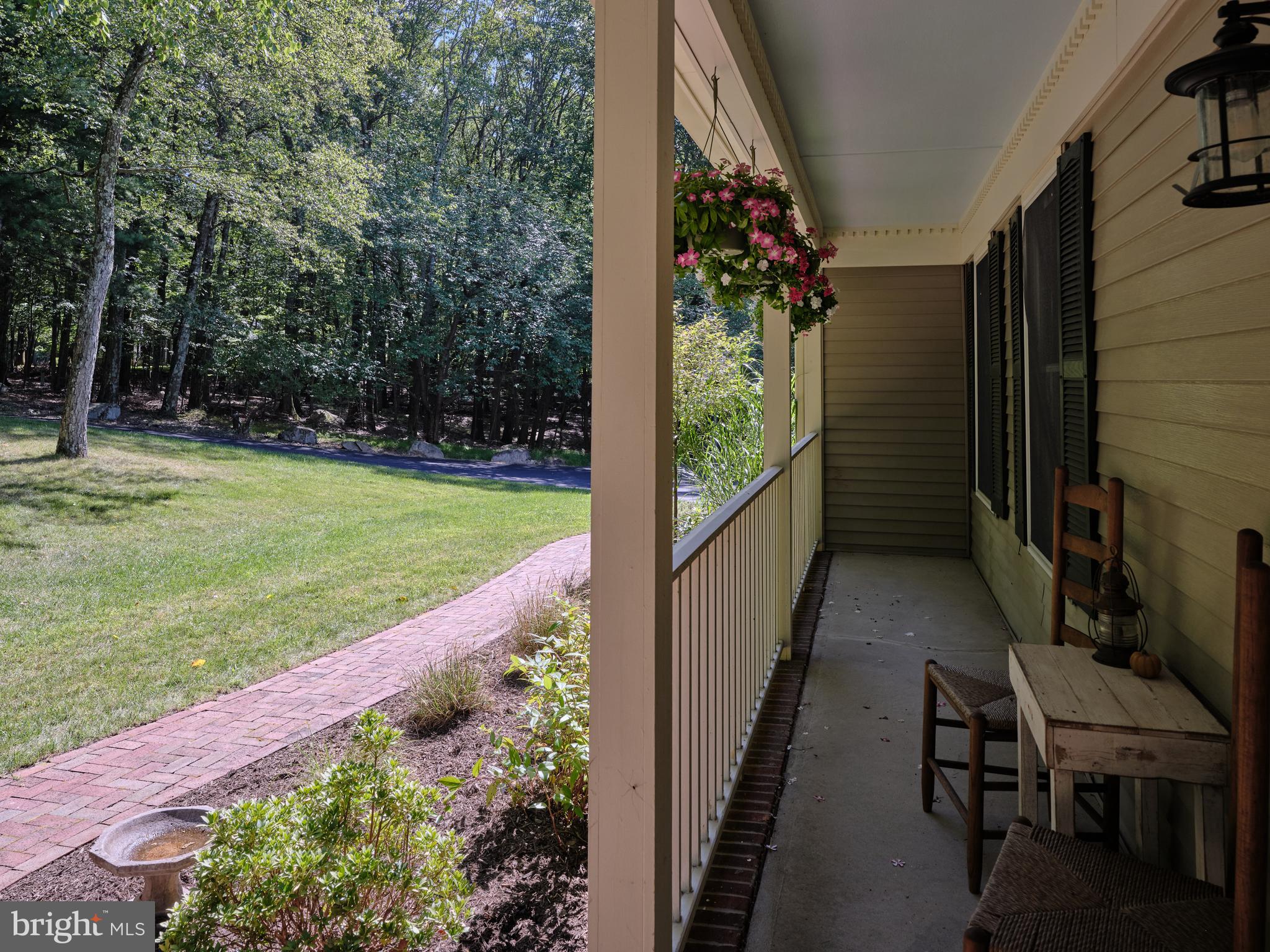 71 Big Spring Road Califon, NJ 07830 - Photo 4 of 41 a view of a balcony with chairs