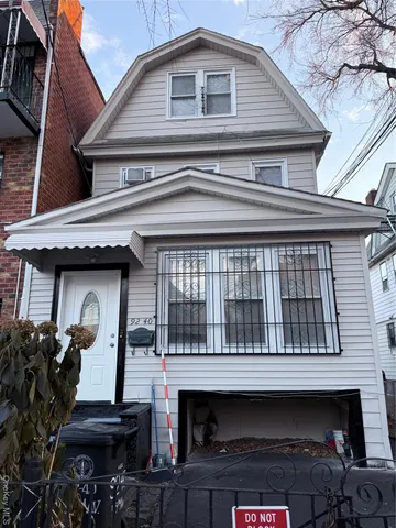 a front view of a house with a balcony