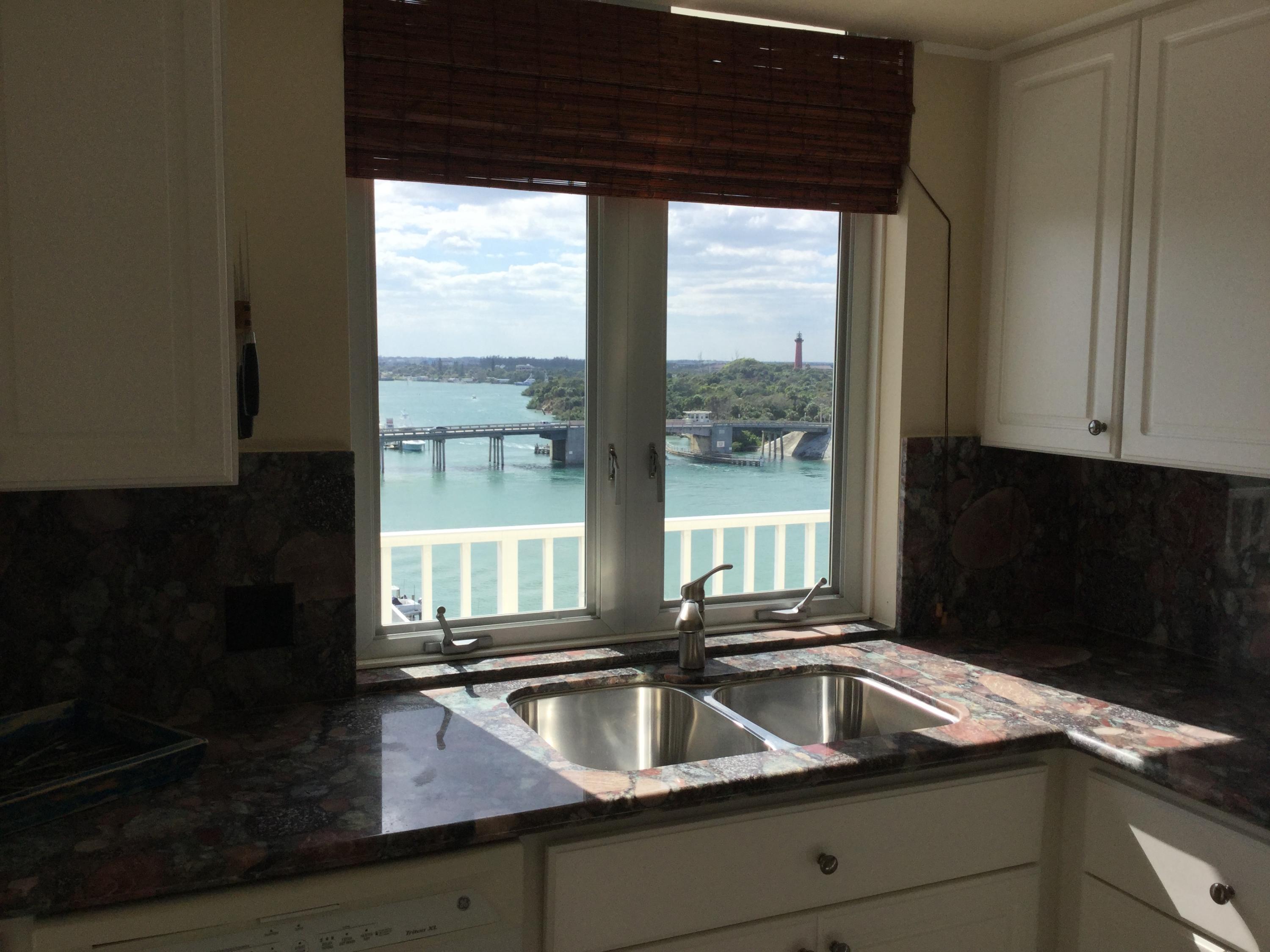 375 South Beach Road, Unit 901 PHA Tequesta, FL 33469 - Photo 7 of 23 Kitchen window view of lighthouse