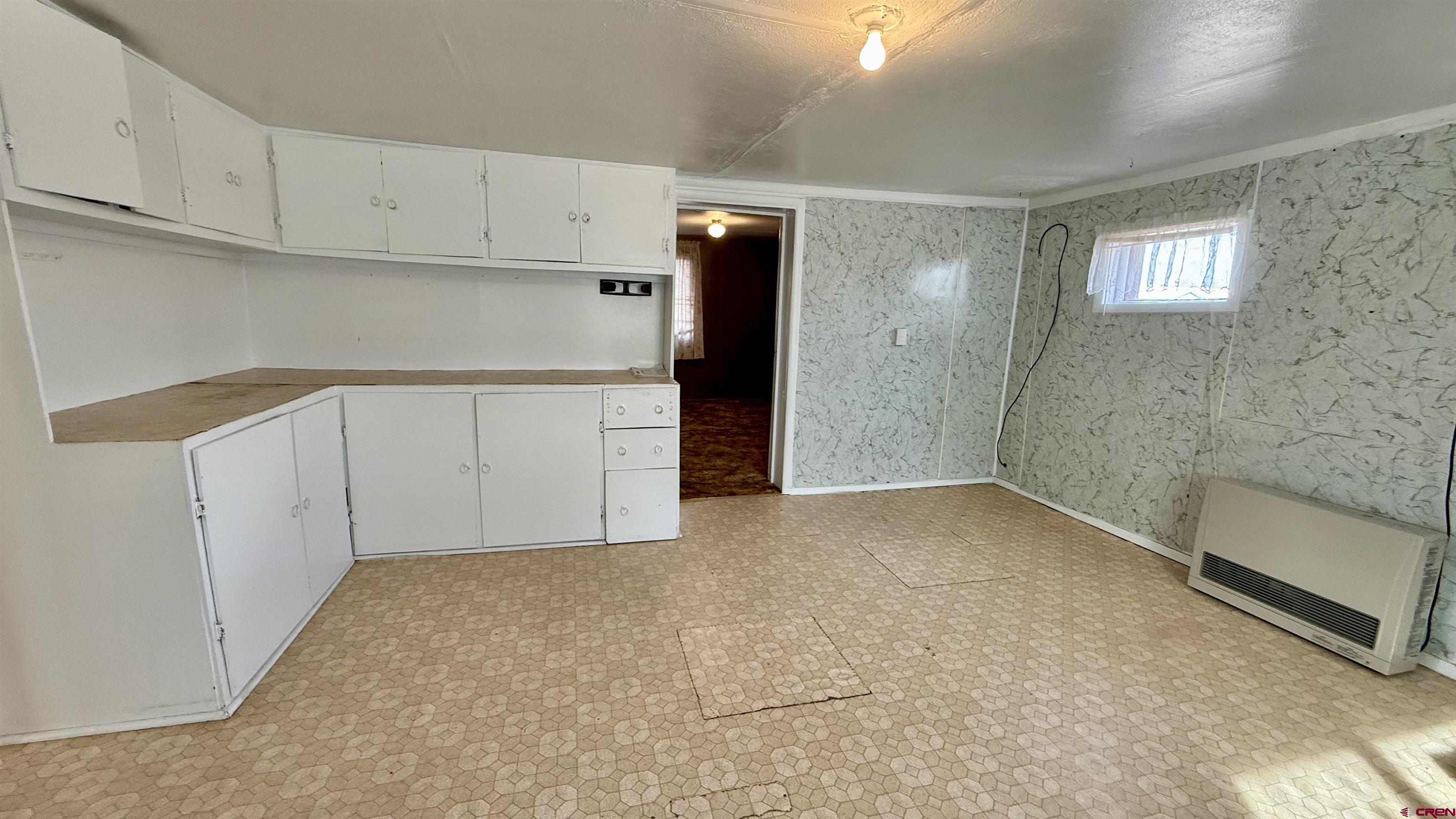 1704 Ross Avenue Alamosa, CO 81101 - Photo 18 of 28 a view of cabinets