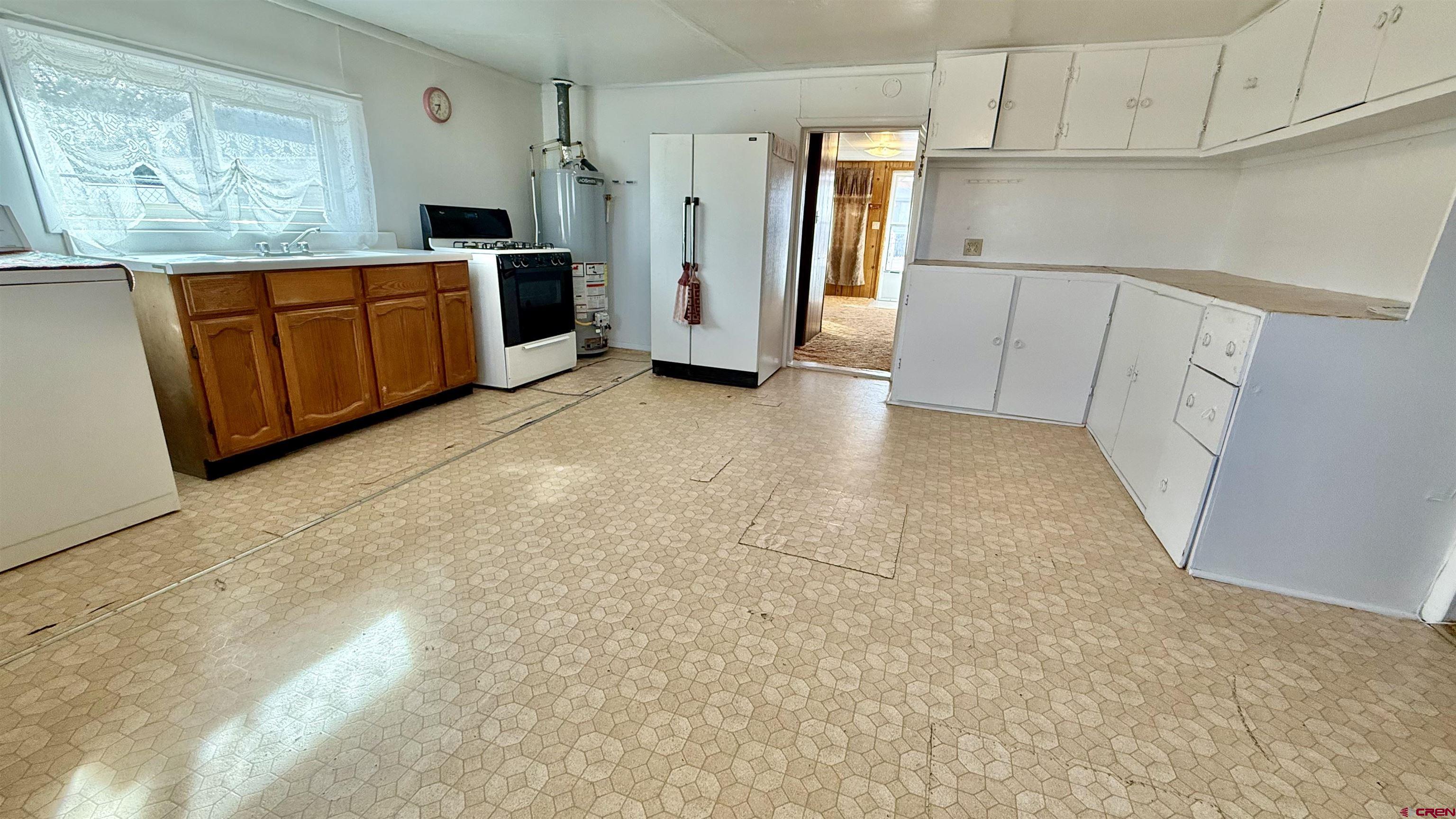1704 Ross Avenue Alamosa, CO 81101 - Photo 22 of 28 a view of utility room