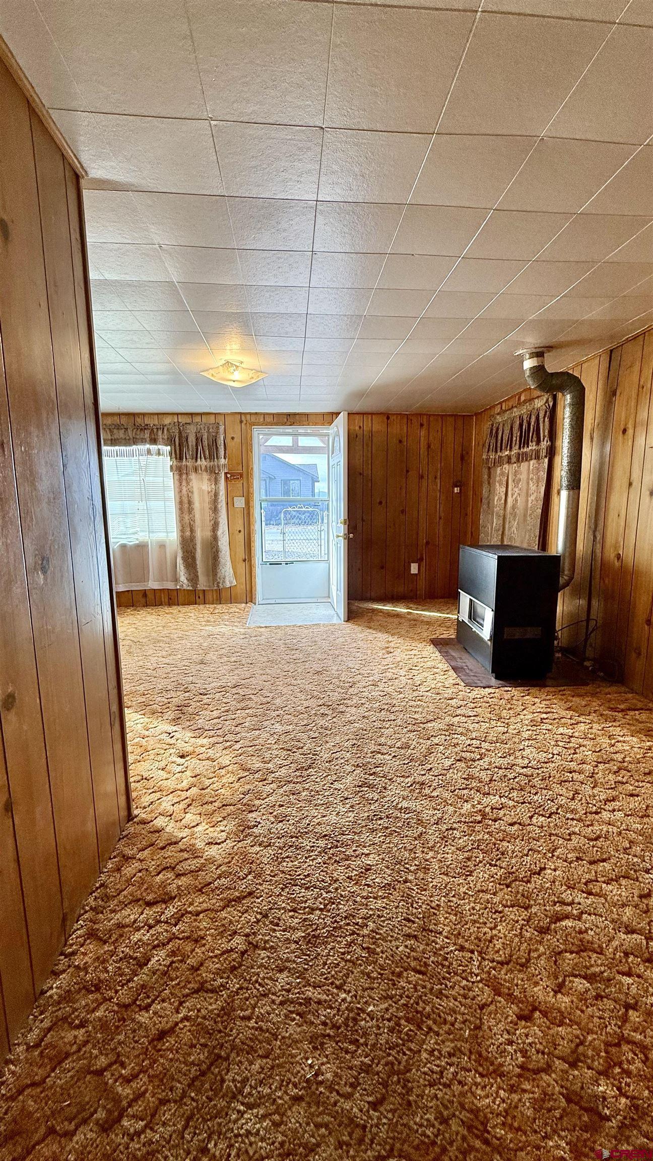 1704 Ross Avenue Alamosa, CO 81101 - Photo 27 of 28 a view of a livingroom with an empty space