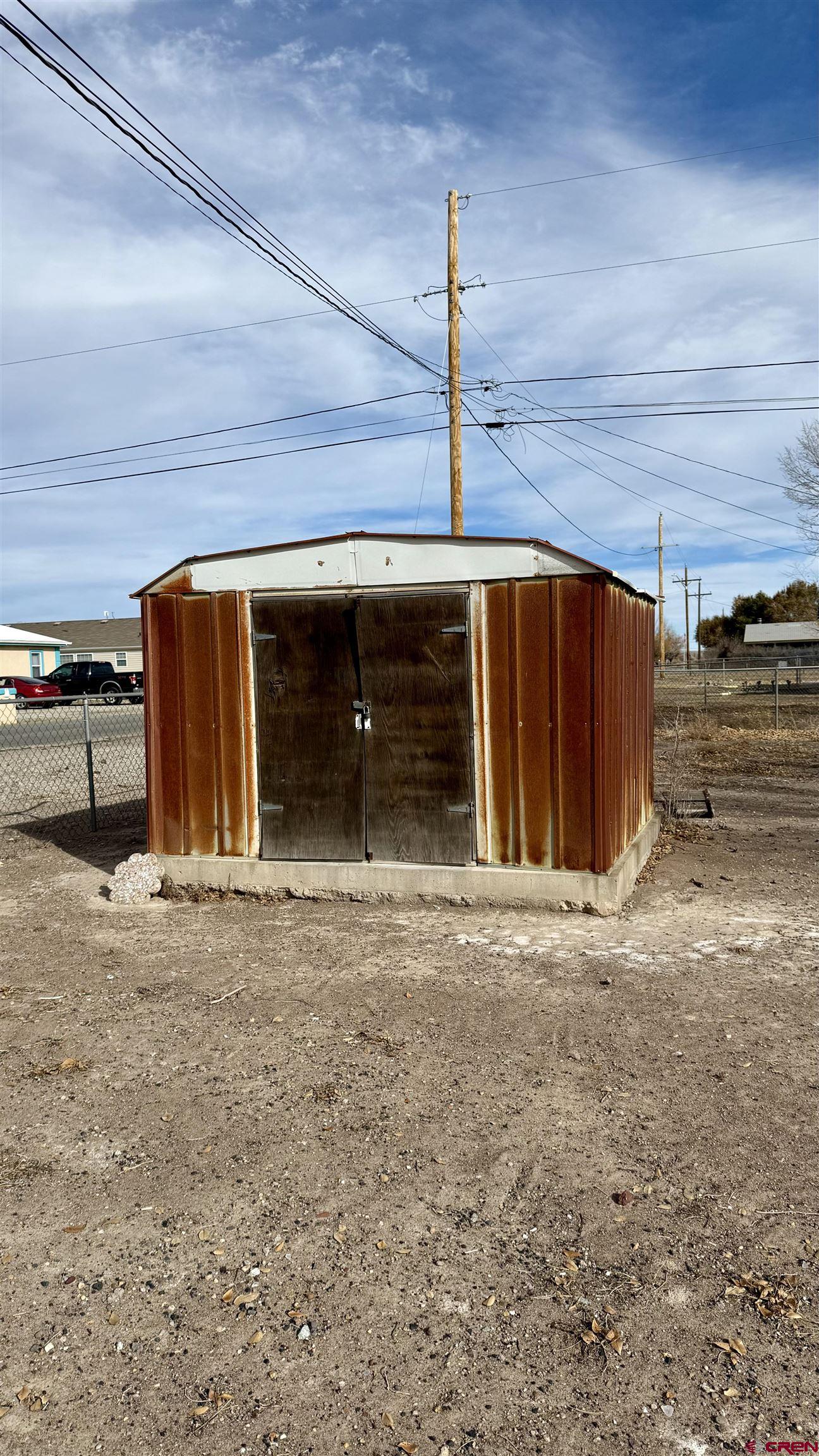 1704 Ross Avenue Alamosa, CO 81101 - Photo 6 of 28 a view of a garage