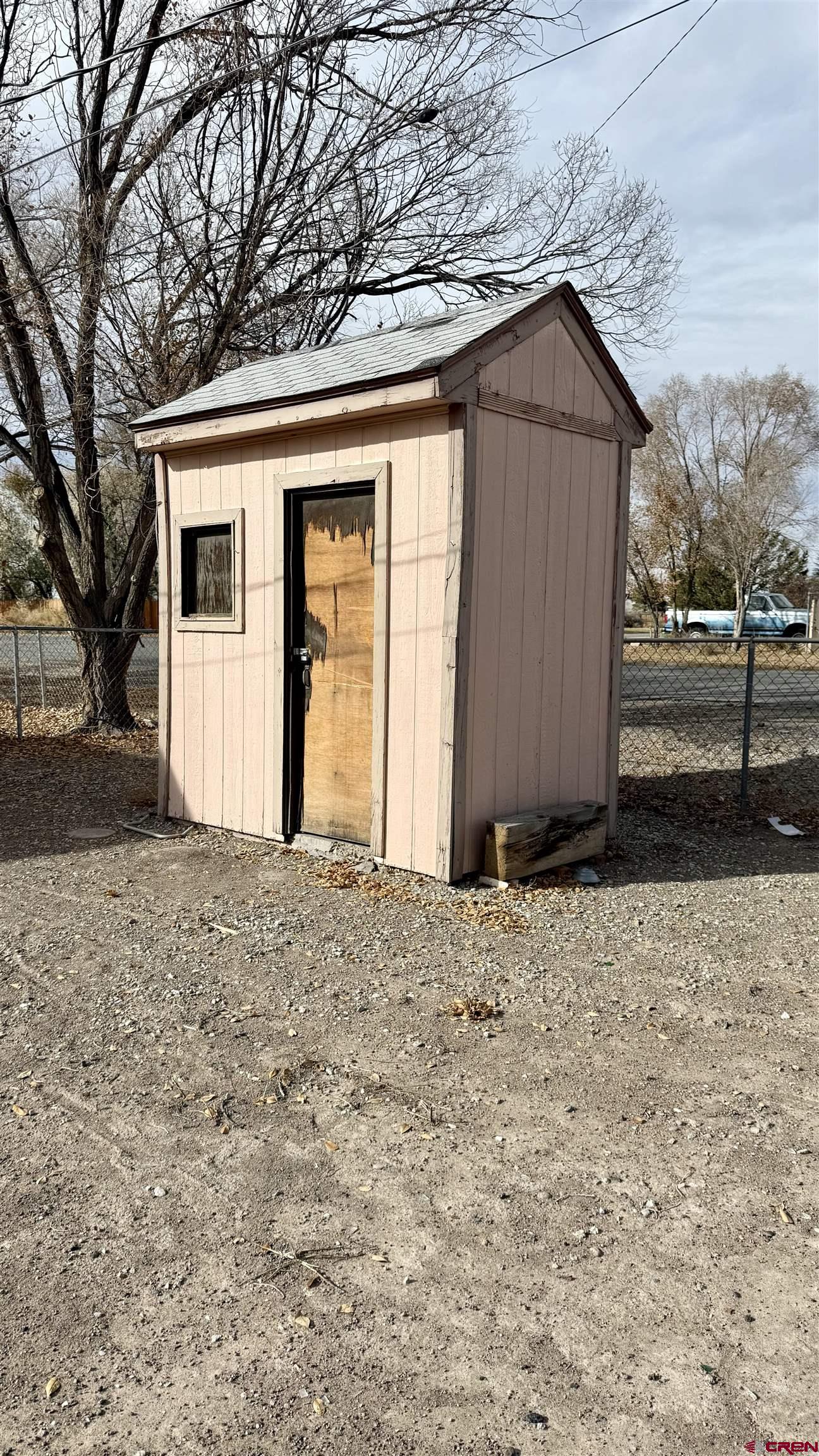 1704 Ross Avenue Alamosa, CO 81101 - Photo 7 of 28 a view of a house with a yard