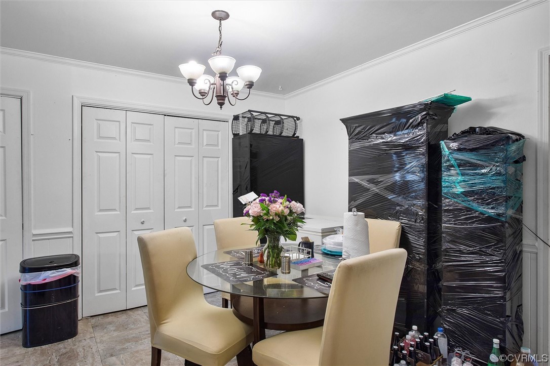 20007 Eugene Drive Sutherland, VA 23885 - Photo 11 of 21 a dining room with furniture and chandelier