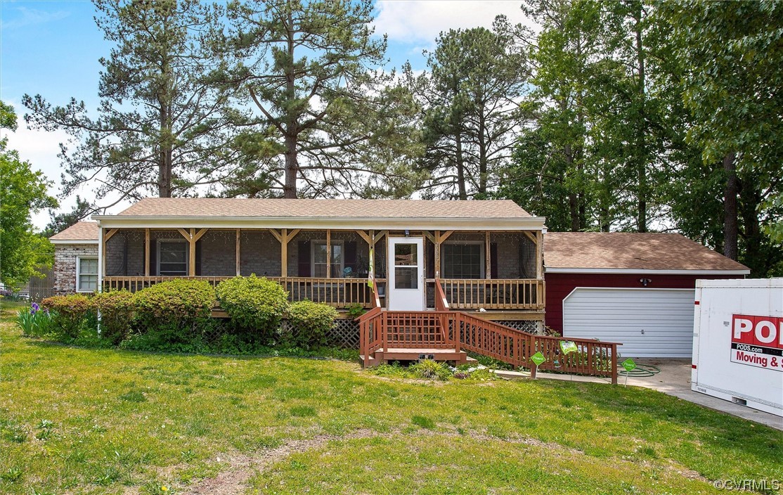 20007 Eugene Drive Sutherland, VA 23885 - Photo 2 of 21 a front view of house with yard and outdoor seating