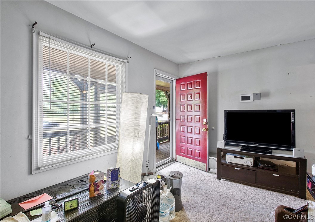 20007 Eugene Drive Sutherland, VA 23885 - Photo 5 of 21 a living room with furniture and a flat screen tv