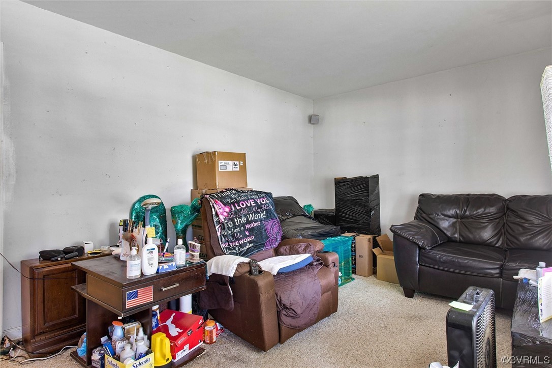 20007 Eugene Drive Sutherland, VA 23885 - Photo 6 of 21 a living room with furniture and a flat screen tv