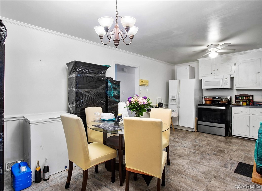 20007 Eugene Drive Sutherland, VA 23885 - Photo 10 of 21 a view of a dining room with furniture and wooden floor