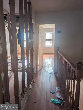 a view of entryway with wooden floor