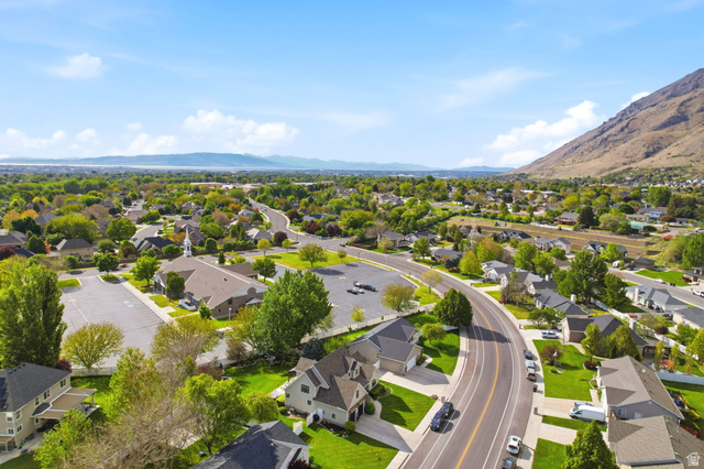 1816 River Bottom Road Springville, UT 84663 - Photo 37 of 37 Aerial perspective of a residential area featuring numerous homes with green lawns and mature trees